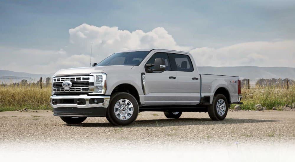 A white 2026 Ford F-250 Super Duty parked off-road.