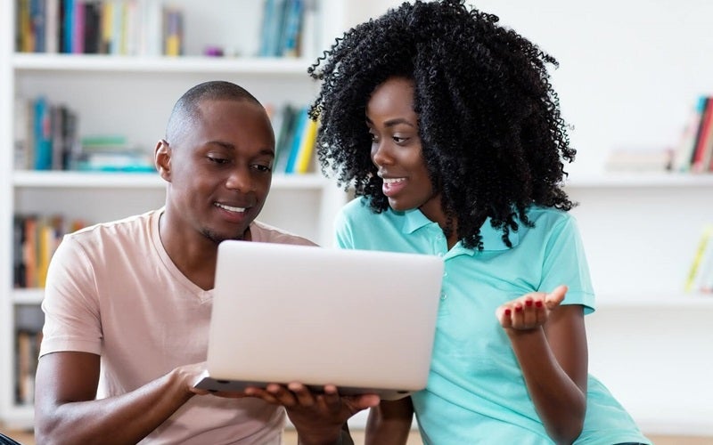 Couple Shopping for a New Ford Online