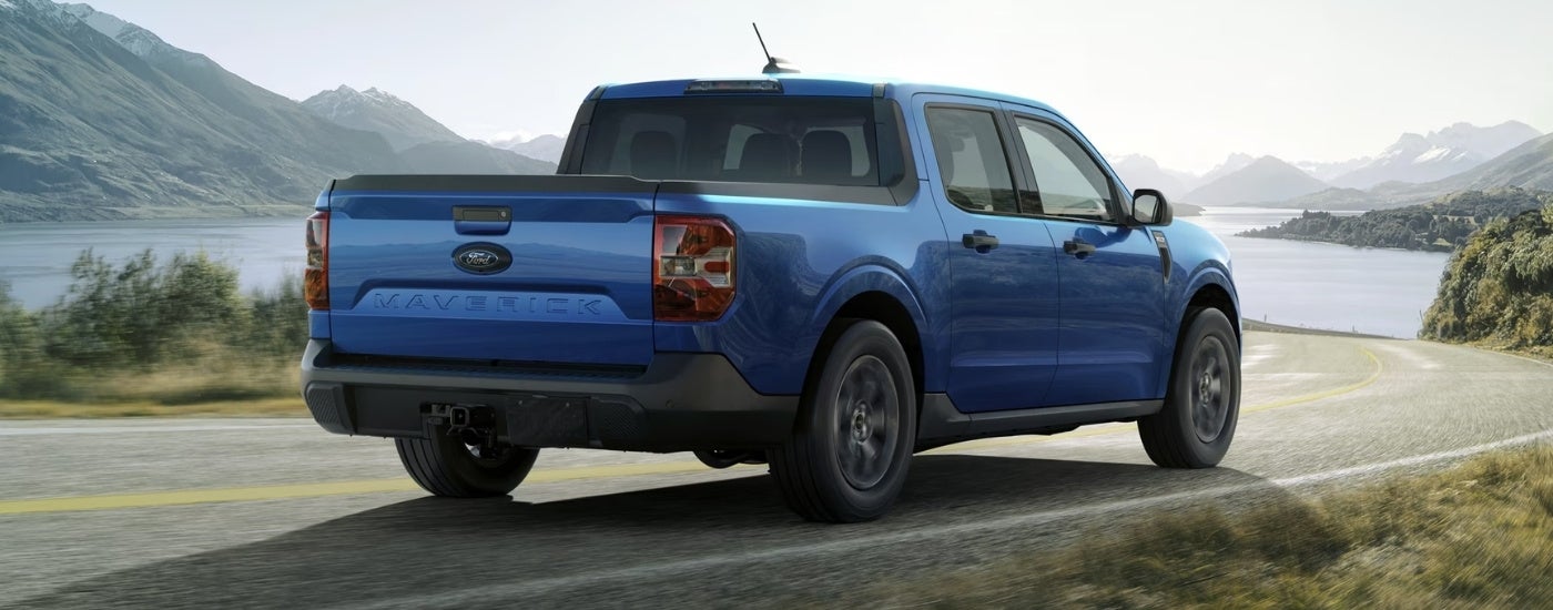 A blue 2025 Ford Maverick from the rear at an angle.
